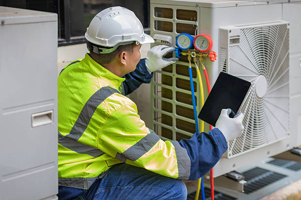 Professional Hvac technician working in Palm Beach Gardens, FL